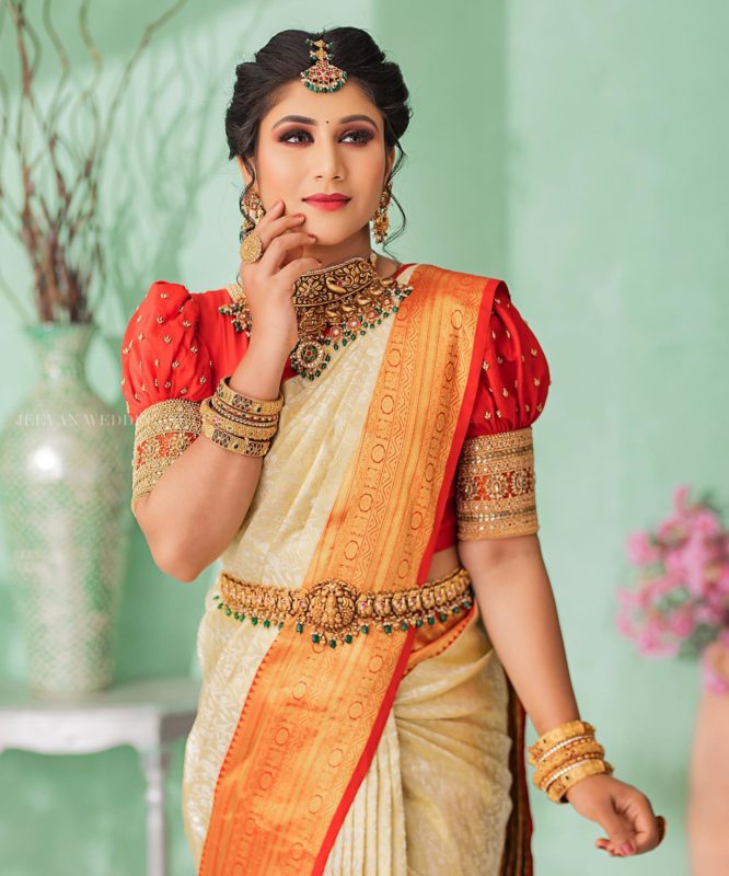 Bengali Haldi Look - gold saree puffed sleeved red blouse