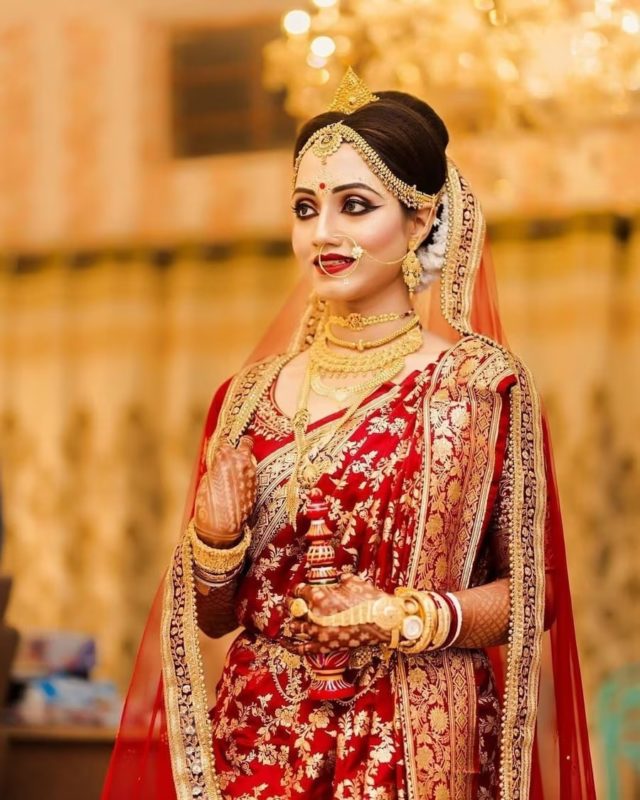 Bengali Haldi Look - red saree with golden zari work