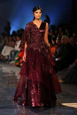 pleated burgundy gown with layered fabric