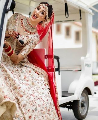entry in a golf cart - bridal entry