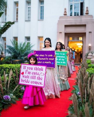 enter with quirky placards - bridal entry