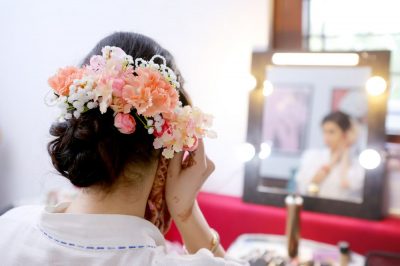 off beat floral bun - bridal hairstyles