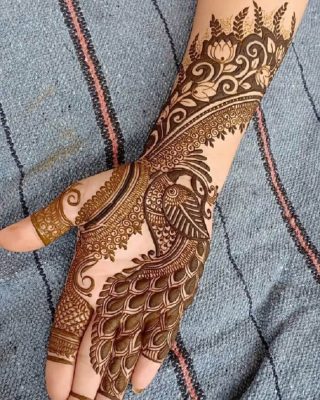 peacock mehendi design with giant peacock motif and other floral motifs for engagement
