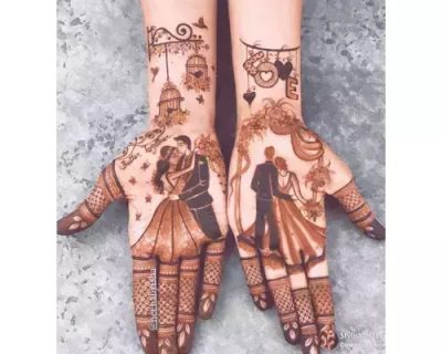 personalized mehendi design where the bride and the groom are enjoying the engagement ceremony