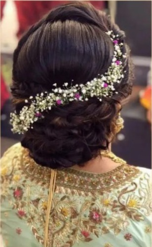 rolled chignon - hairstyles for saree