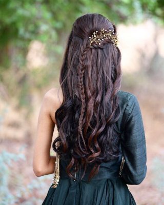unique braided hairstyle with curls and accessories