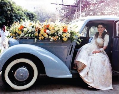 entry in a vintage car - bridal entry