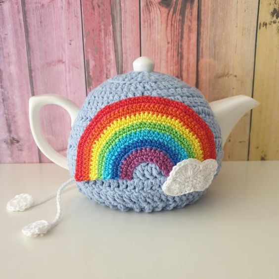 Tea Pot with Tea cozies to keep tea warm in a High Tea Party