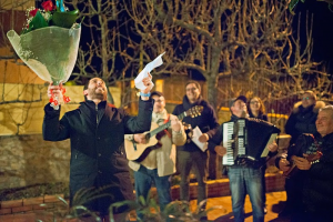 Italian man serenading his fiance a day before their wedding