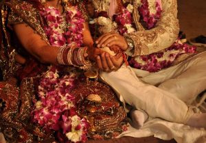 couple getting married traditionally