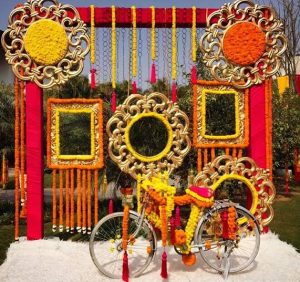 cycle and frames with marigold flowers photo backdrop