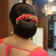 Bun hairstyle for mother of the bride or the groom  Threads  WeRIndia