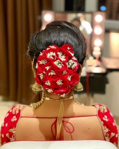 Bun Hairstyles for the Bride_bun with red roses