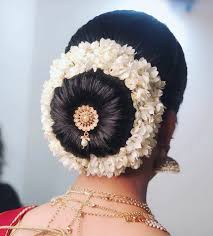 Bun Hairstyles for the Bride_flowers and tiny broach