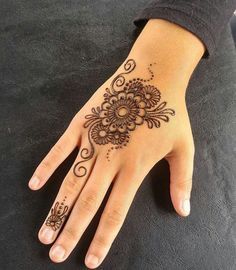 mehendi designs for kids _ back elaborate flower ornament