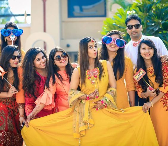 Haldi Poses with Friends