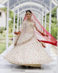 White Lehenga Wedding with Red Dupatta