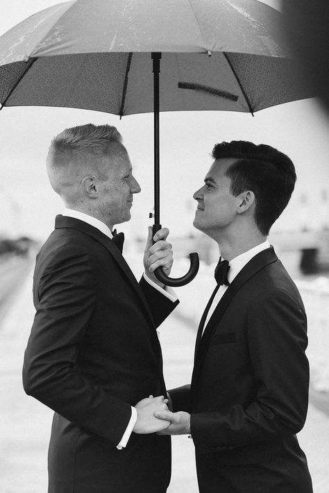 holding an umbrella Gay Wedding Photoshoot