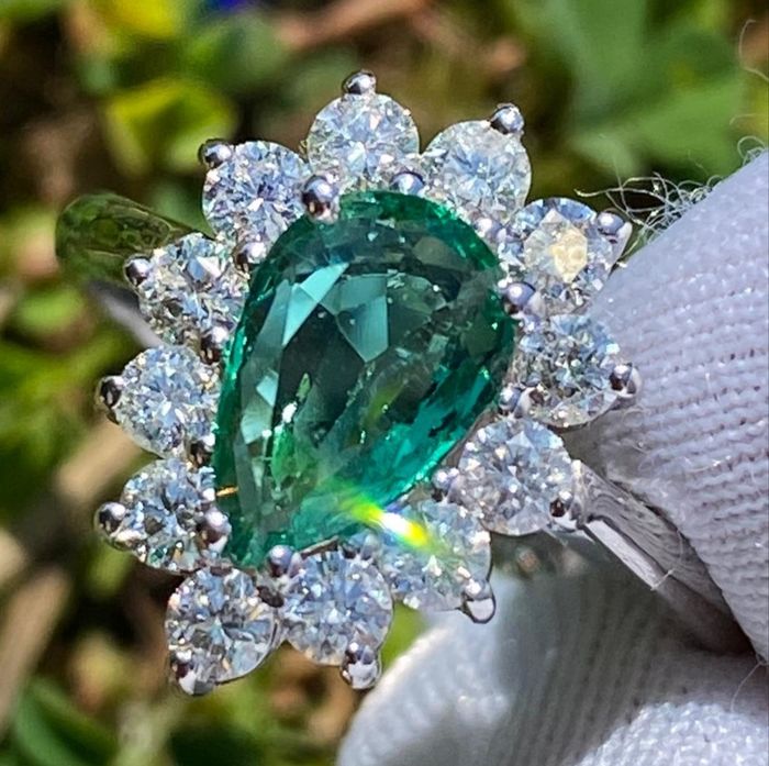 emerald drop ring as bridal jewelry essentials