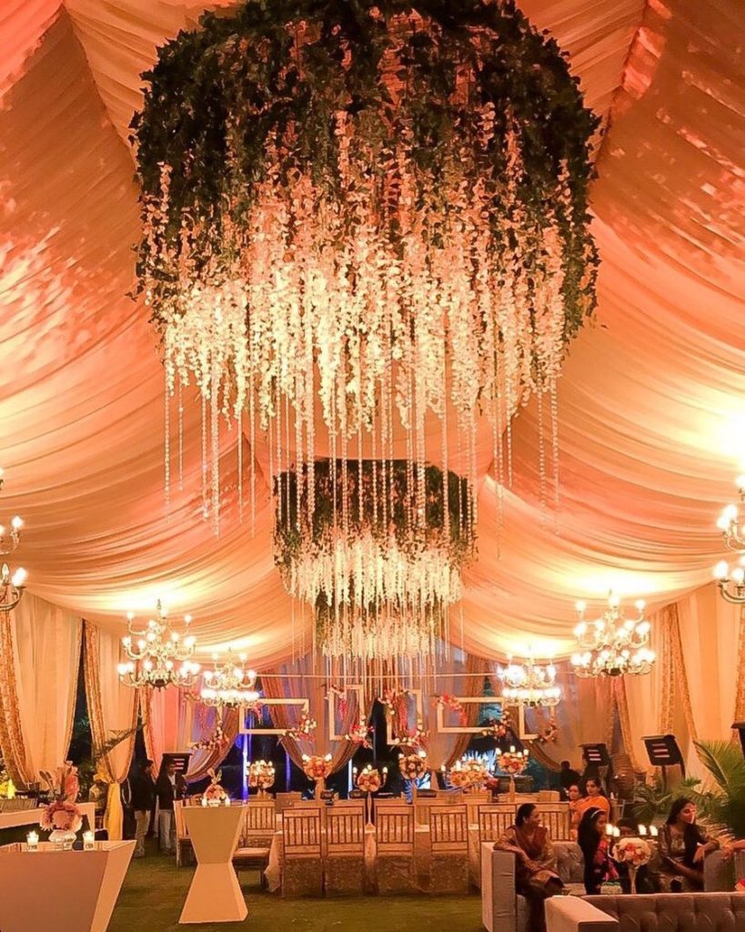 pastel wedding theme lights and chandeliers