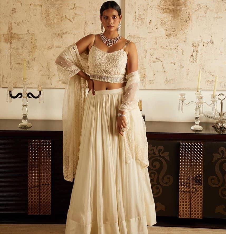 biege and white bridal lehenga