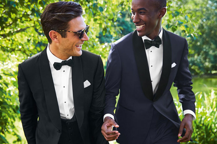 bow tie suit as a men's wedding guest outfits 2021