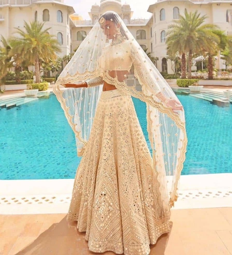 foil mirror work white bridal lehenga