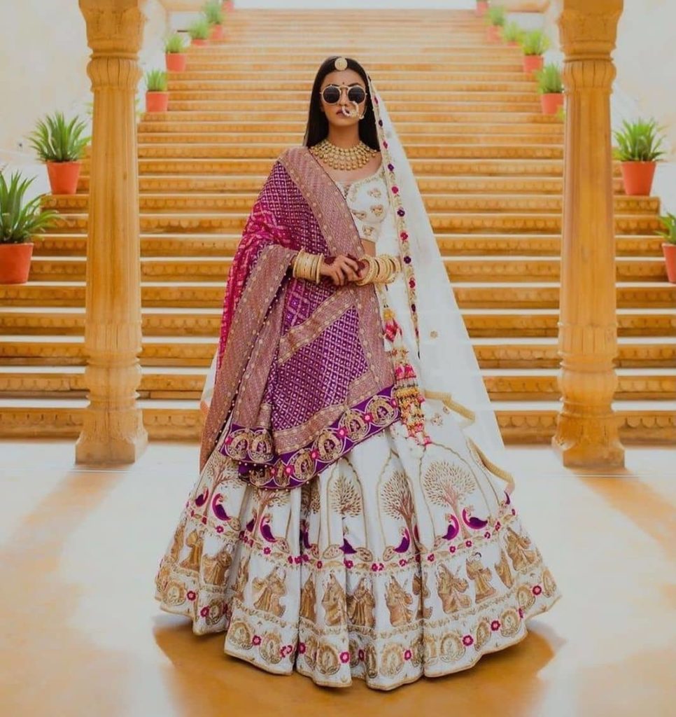 purple dupatta white bridal lehenga