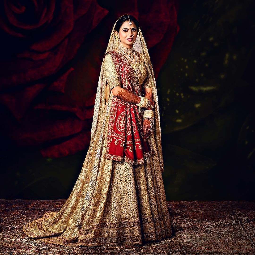 White Lehenga With Red Bandhani Dupatta