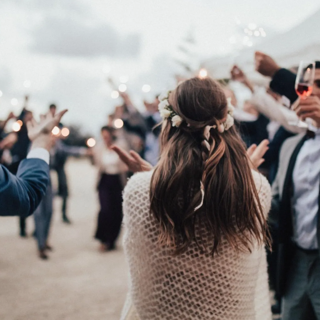 People Cheering up the host- How to play the wedding shoe game 