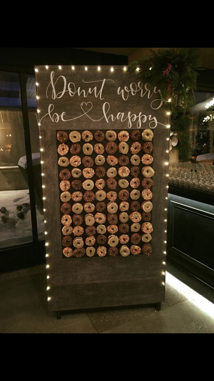 A Quirky Donut Pun- wedding donut wall ideas- wedding donut wall ideas