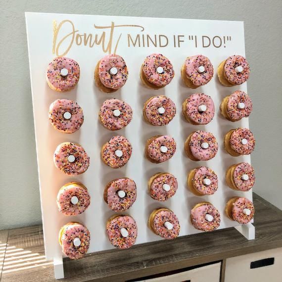 Whimsical And Vibrant Pink themed donut wall