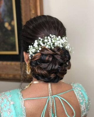 floral bun summer wedding hairstyles for haldi