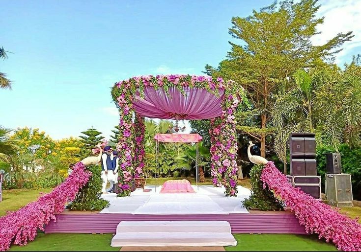 Design of Mandap with Peacock Chairs and Wicker Chandeliers