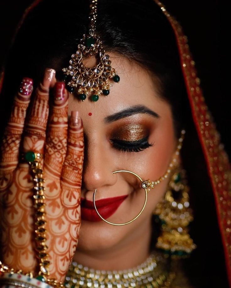 Glittery Eyes and Red Lips for South Bridal Look