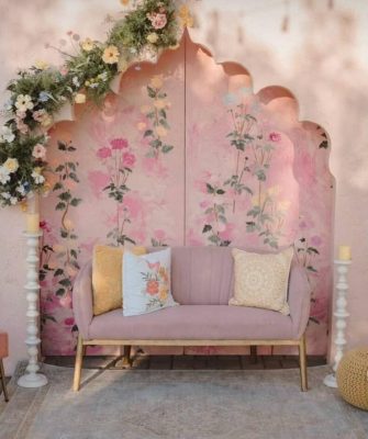 Royal palace-style wedding photo booth setup at luxury wedding venue