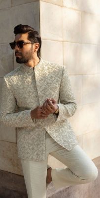 contemporary groom outfits with heavy embroidery