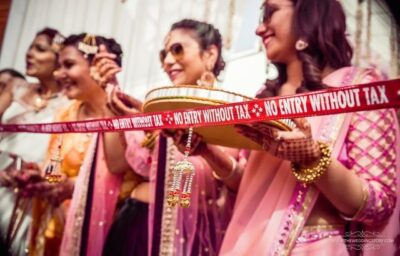 Indian wedding ritual where baraat is stopped for entry negotiation