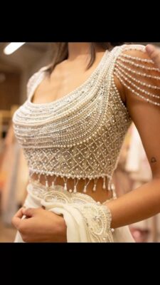 Trendy blouse designs pearl embellished sculpted bustier blouse
