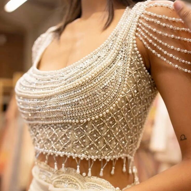 Trendy blouse designs pearl embellished sculpted bustier blouse