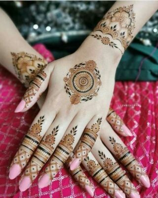 trending mehendi backhand mandala mehendi with negative space detailing