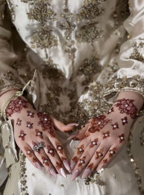 elegant embellished mehendi with pearl detailing
