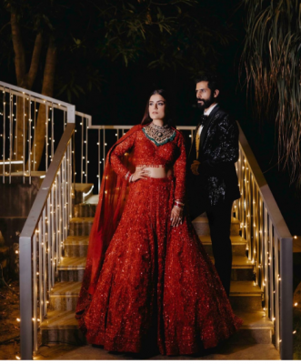 wedding dress combination for bride and groom in maroon and black attire