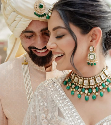 coordinated jewellery and outfit styling for bride and groom wedding look