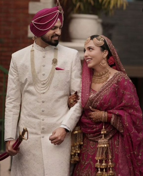 bride and groom coordinated outfits with subtle color matching