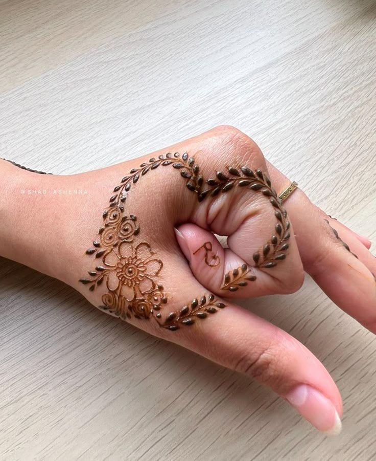 Tiny Love Symbols mehndi