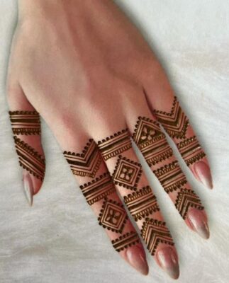 geometric half finger mehendi design with modern negative space